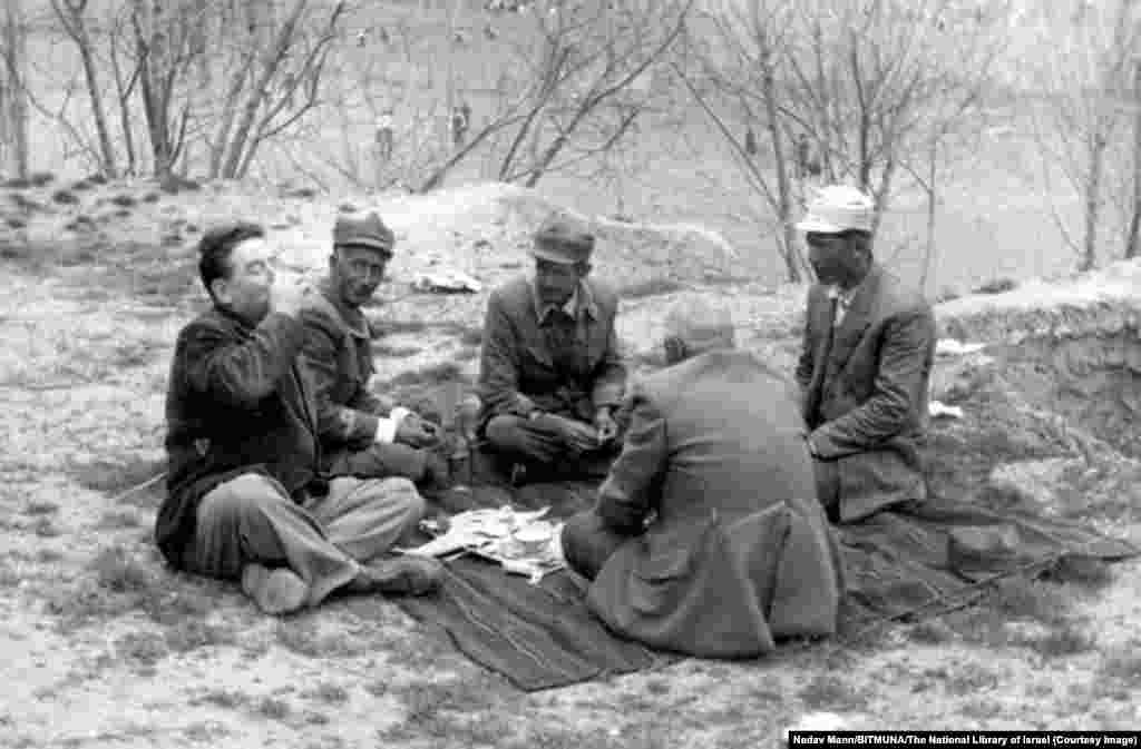 An Israeli traveler (left) knocks back a drink alongside workers near the Shatt al-Arab River in western Iran in the 1950s.Israelis living in Iran before the 1979 revolution recall being uninterested in the repressions enacted by the Shah on his own people. "They didn’t complain and we didn’t intervene," one Israeli man recalled in a film about the prerevolutionary period. "We’re not blind, we knew what kind of reality we were living in, but it’s not our bloody business," he added.