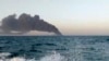 Smoke rises from the Kharg in the Gulf of Oman on June 2.