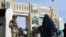 A Pakistani soldier keeps guard at the Friendship Gate, which marks the Afghan border crossing at the Pakistani town of Chaman.