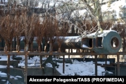 A detail of an apparent self-propelled howitzer at the workshop