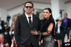 Iranian director Ali Asgari and Iranian actress Sadaf Asgari attend the red carpet event for the screening of A Little Light, presented in competition at the 83rd International Venice Film Festival, on September 11.