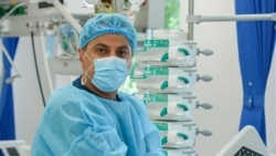 Pakistani-born Muhammad Armghan working as a nurse at the Emergency Medicine Institute in Moldova 