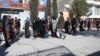 Relatives of the victims arrive at the site where gunmen shot dead two Afghan female judges working for the Supreme Court in Kabul on January 17. 