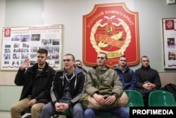 Conscripts are seen at a local draft office before departing for military service with the Russian Army, in Moscow in October 2024.