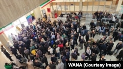 An image purporting to show Iranian workers departing by ferry from mainland Iran to Kharg after the March 13 strikes.