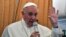 Pope Francis talks to journalists on his flight back to Rome following a visit to Armenia on June 26.
