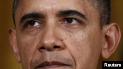 U.S. -- U.S. President Barack Obama makes remarks about the situation in Libya in the East Room at the White House in Washington, 18Mar2011