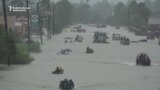 Residents Flee Flooded Neighborhoods In Houston