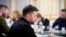In this handout photograph taken on February 6, Ukrainian President Volodymyr Zelenskyy chairs a meeting with journalists at his office in Kyiv. 