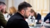 In this handout photograph taken on February 6, 2026 and released on February 7, 2026 by the Ukrainian Presidential Press Service, Ukraine's President Volodymyr Zelensky chairs a meeting with journalists at his office in Kyiv, amid the Russian invasion of