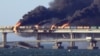 Пожар на Керченском мосту после взрыва на нем. Украина, аннексированный Крым, 8 октября 2022 года