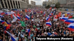 People take part in a rally in support of independent candidates for Moscow's elections on July 20.