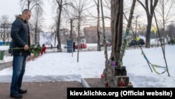 Kyiv Mayor Vitaliy Klitschko lays flowers at the so-called Monument of the Heavenly Hundred on Kyiv's Independence Square on February 18.