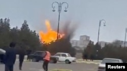 Eyewitness videos show the moment a drone launched from Iran explodes at Nakhchivan airport in Azerbaijan.