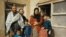 Kabir with his family outside their home in the Kart-i-Sei district of western Kabul