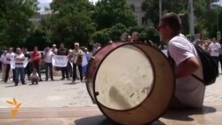 Moldovans Dump Shoes In Protest At Central Bank