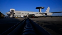A NATO air-surveillance aircraft sits on the tarmac on September 19 ahead of a flight over Polish airspace, part of the alliance's Eastern Sentry mission.