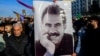 Supporters display a poster depicting jailed leader of the Kurdistan Workers' Party (PKK) Abdullah Ocalan, 75, after he called on the Kurdistan Workers' Party (PKK) to disarm and dissolve itself in Diyarbakir, southeastern Turkey, on February 27, 2025.