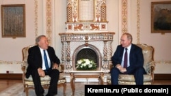 Президент России Владимир Пуtин и бывший президент Казахстана Нурсултан Назарбаев. Московская область, 13 декабря 2024 года