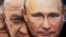 Într-un magazin de suveniruri din Sankt Petersburg, măști cu fețele președintelui rus Vladimir Putin și a liderului mercenarilor Wagner, Evgheni Prigojin, Rusia, 4 iunie 2023. 