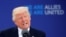 U.S. President Donald Trump speaks at the start of the NATO summit at the alliance's new headquarters in Brussels on May 25.