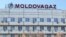The logo of the Moldovagaz energy company is seen on the facade of the building in Chisinau