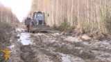 A Muddy Tractor Ride Through Siberia