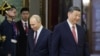 Russian President Vladimir Putin and Chinese President Xi Jinping attend a meeting at the Kremlin in Moscow in May.