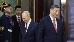 Russian President Vladimir Putin and Chinese President Xi Jinping attend a meeting at the Kremlin in Moscow in May.