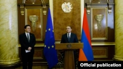 Armenia - Prime Minister Hovik Abrahamian (R) and the head of the EU Delegation, Traian Hristea, speak at a ceremony in Yerevan,16 Jan2015