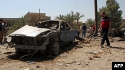 Pamje nga një sulm i mëparshëm me makinë-bombë në lagjen Baladijat në Bagdad