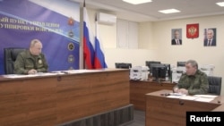 Лідер РФ Володимир Путін та очільник Генштабу ЗС РФ Валерій Герасимов в командному центрі угруповання армії РФ в жовтні 2025 року