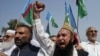 Pakistan -- Supporters of the Pakistani religious political party Jamaat-e-Islami shout anti-American slogans during a demonstration in Peshawar, 15Sep2012