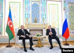 Ильхам Алиев и Владимир Путин в Душанбе, 9 октября