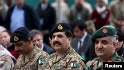 Pakistani army chief General Raheel Sharif (C) participated in a change of command ceremony at NATO's Resolute Support headquarters in Kabul on March 2.