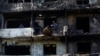 Жилой дом в Киеве, сильно поврежденный российским воздушным ударом. 14 октября 2026 года
