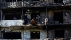 Жилой дом в Киеве, сильно поврежденный российским воздушным ударом. 14 октября 2026 года