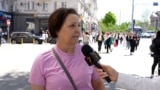 Moldova: a woman speaking at RFE mic in Chisinau