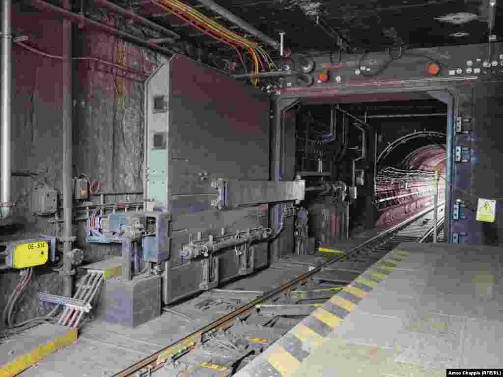 A blast door at Prague&rsquo;s Dejvicka metro station seen as a train approaches. Most of the OSM was built during the Cold War, but updated versions of the Soviet-era system have been incorporated into some newer subway stations built by independent Czechia. &nbsp; &nbsp;