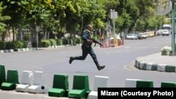 A Revolutionary Guard during the attack on parliament in Tehran, June 7, 2017.