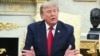 US President Donald Trump speaks during a meeting with Iraqi Prime Minister Ali al-Zaidi at the White House on July 14.