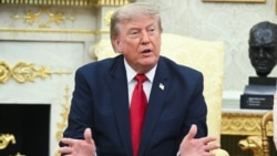 US President Donald Trump speaks during a meeting with Iraqi Prime Minister Ali al-Zaidi in the Oval Office of the White House on July 14, 2026.