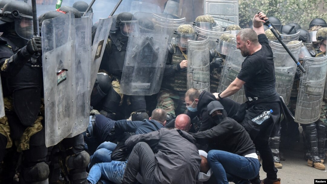 NATO Kosovo Force soldiers clash with local Kosovo Serb protesters in the town of Zvecan, northern Kosovo, on May 29. 