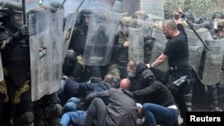NATO Kosovo Force soldiers clash with local Kosovo Serb protesters in the town of Zvecan, northern Kosovo, on May 29. 