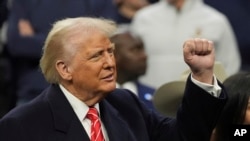 President Donald Trump attends the finals at the NCAA wrestling championship, Saturday, March 22, 2025, in Philadelphia.