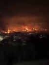 Fire and smoke rising from an oil refinery near Russia's Black Sea port of Tuapse 