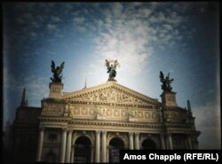 The Lviv Theater of Opera and Ballet in morning sunlight.