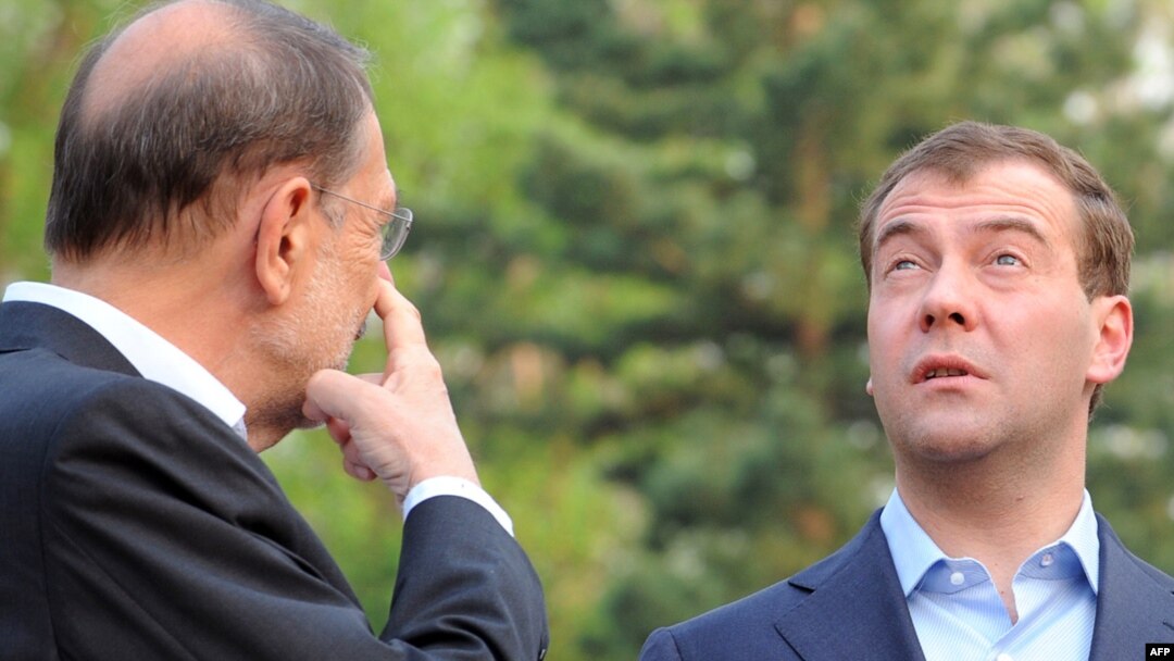 "How 'bout this weather?" Russian President Dmitry Medvedev (right) with EU foreign policy chief Javier Solana prior to an EU-Russia summit in May 2009