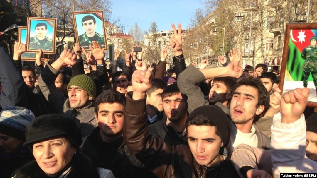Twenty-one men have been fined for participating in a Baku demonstration to raise awareness about the deaths of army conscripts.