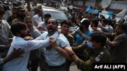 Police detained a supporter of Pakistani Muslim League Nawaz (PML-N) after opposition leader Shehbaz Sharif was arrested in a money laundering case in the eastern city of Lahore on September 28.